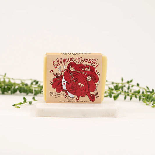Barre de shampoing solide Madame Tignasse de la Savonnerie des Diligences, dans son emballage.